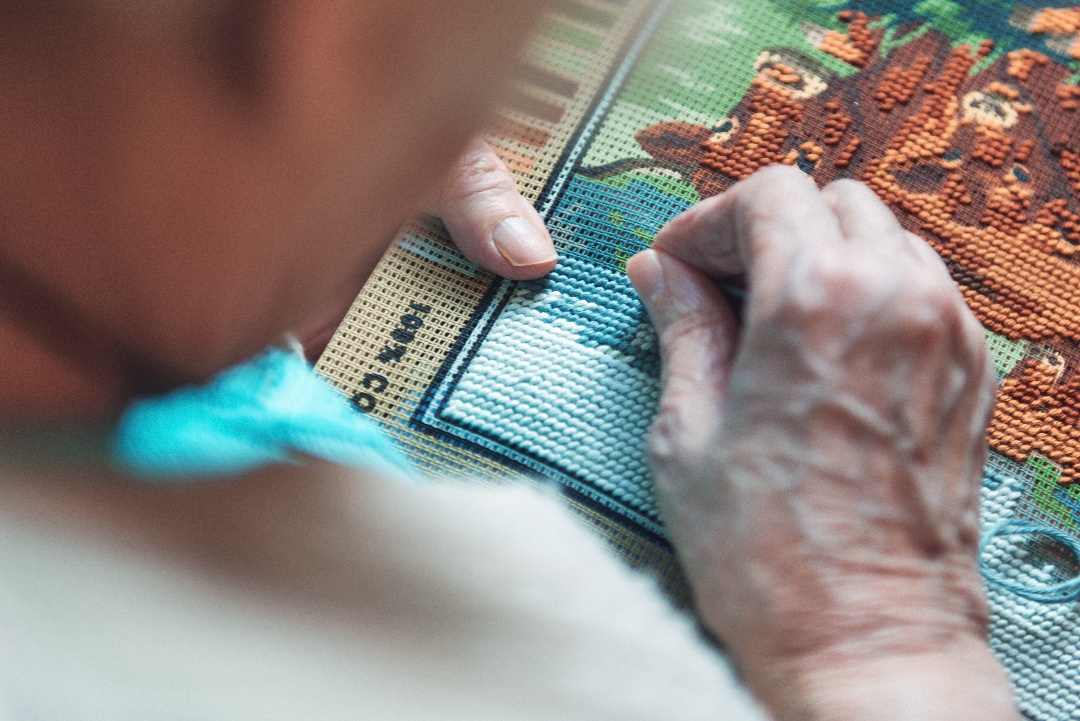 hands-of-an-elderly-woman-working-with-coloring-th-2023-11-27-04-58-58-utc-1